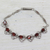 Garnet link bracelet, 'Nature's Delight' - Floral Garnet Bracelet Handcrafted in Sterling Silver thumbail