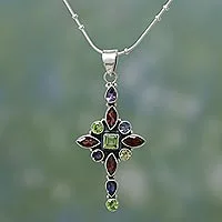 Amethyst and garnet pendant necklace, 'Star Cross' - Colorful Gemstone Cross Set in Sterling Silver from India