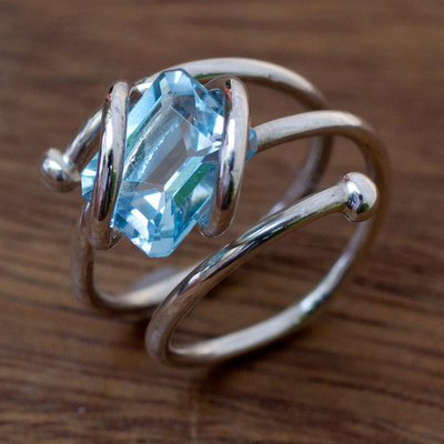 Blue topaz wrap ring, 'Sky Force' - Handcrafted Modern Sterling Silver Wrap Blue Topaz Ring