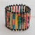 Recycled paper bracelet, 'Novelty' - Handcrafted Recycled Paper Wristband Bracelet (image 2) thumbail