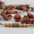 Recycled paper beaded necklace, 'Novel' - Recycled Paper and Goldstone Necklace (image 2d) thumbail