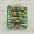 Recycled paper wristband bracelet, 'Nature Tales' - Recycled paper wristband bracelet thumbail