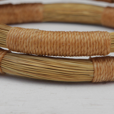 Golden grass bangle bracelets, 'Jalapão Equilibrium' (pair) - Pair of Handcrafted Golden Grass Bangle Bracelets