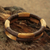 Goldene Gras-Armreifen, 'Jalapo-Symmetrie' (Paar) - Paar handgefertigte goldene Gras-Armreif-Armbänder