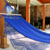 Cotton hammock with spreader bars, 'Tropical Blue' (single) - Blue Cotton Hammock with Crocheted Fringe (Single) thumbail