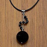 Agate pendant necklace, 'Moving On' - Black Agate and 925 Silver Pendant on Black Rubber Necklace