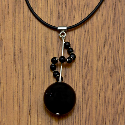 Agate pendant necklace, 'Moving On' - Black Agate and 925 Silver Pendant on Black Rubber Necklace