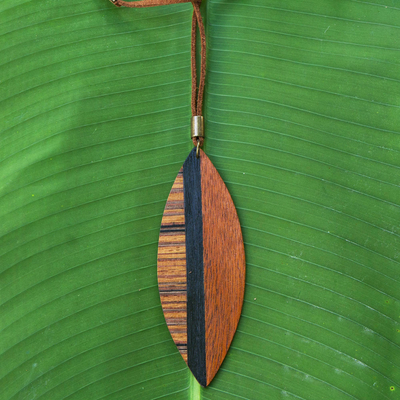 Wood pendant necklace, 'Jungle Beauty' - Long Brown Wood Pendant Necklace from Brazil