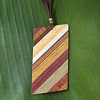 Wood pendant necklace, 'Distinguished Traveler' - Rectangular Wood Pendant Necklace by Brazilian Artisans