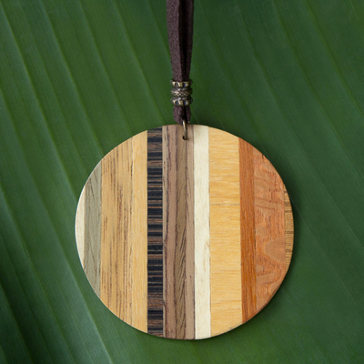 Wood pendant necklace, 'Circle Traveler' - Circular Wood Pendant Necklace from Brazil