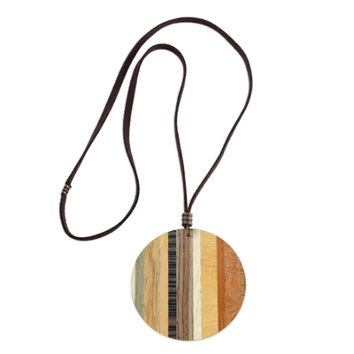 Wood pendant necklace, 'Circle Traveler' - Circular Wood Pendant Necklace from Brazil