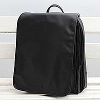 Leather backpack, 'Mysterious Traveler' - Handcrafted Black Leather Backpack with a Flap from Brazil