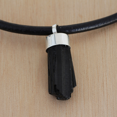 Tourmaline pendant necklace, 'Sculpted Strength' - Black Tourmaline Pendant Necklace with Black Leather Cord