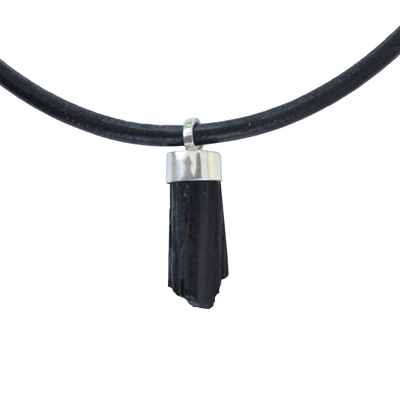 Tourmaline pendant necklace, 'Sculpted Strength' - Black Tourmaline Pendant Necklace with Black Leather Cord
