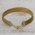 Gold accented golden grass wristband bracelet, 'Gleam of the Sun' - Gold Accented Golden Grass Wristband Bracelet from Brazil