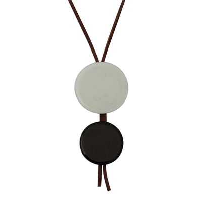 Art glass and leather pendant necklace, 'Circular Modernity' - Black and White Art Glass and Leather Pendant Necklace