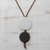 Art glass and leather pendant necklace, 'Circular Modernity' - Black and White Art Glass and Leather Pendant Necklace (image 2b) thumbail
