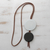 Art glass and leather pendant necklace, 'Circular Modernity' - Black and White Art Glass and Leather Pendant Necklace (image 2c) thumbail