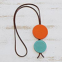Glass and leather pendant necklace, 'Orange Eclipse' - Orange and Blue Glass and Leather Pendant Necklace