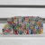 Recycled aluminum pop-top wristlet, 'Eco-Friendly Rainbow' - Colorful Recycled Aluminum Pop-Top Wristlet from Brazil