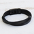 Faux leather wristband bracelet, 'Bold Overlap in Black' - Modern Faux Leather Wristband Bracelet with a Black Clasp