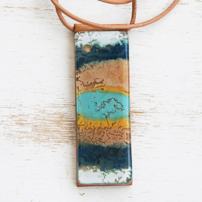 Glass and leather pendant necklace, 'Layers of Ocean' - Blue and Brown Glass and Leather Pendant Necklace
