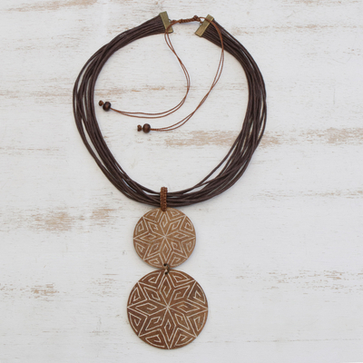 Wood pendant necklace, 'Intricate Stars' - Star Pattern Wood Strand Pendant Necklace from Brazil