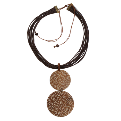 Wood pendant necklace, 'Intricate Stars' - Star Pattern Wood Strand Pendant Necklace from Brazil