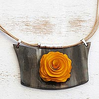 Wood and horn pendant necklace, 'Sunny Flower' - Yellow Flower Wood and Horn Pendant Necklace from Brazil