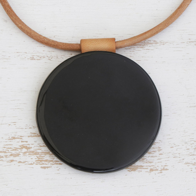 Fused glass pendant necklace, 'Mysterious Midnight' - Black Fused Glass Disc Pendant Brown Leather Cord Necklace