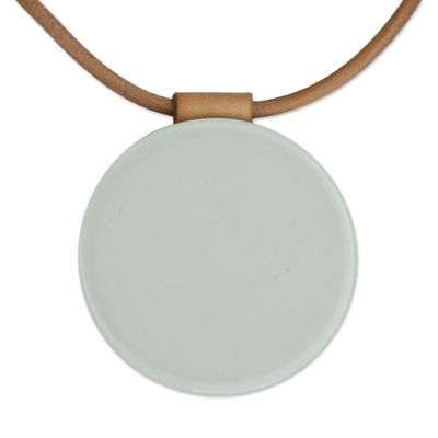 Art glass pendant necklace, 'Rising Moon' - White Art Glass Disc Pendant Brown Leather Cord Necklace
