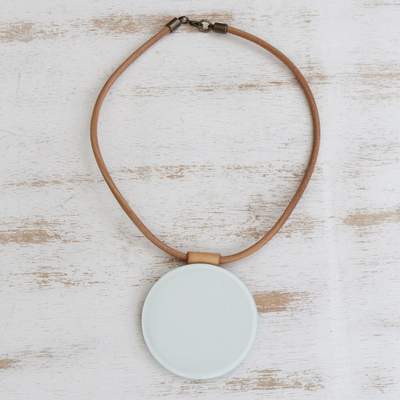 Art glass pendant necklace, 'Rising Moon' - White Art Glass Disc Pendant Brown Leather Cord Necklace