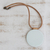 Art glass pendant necklace, 'Rising Moon' - White Art Glass Disc Pendant Brown Leather Cord Necklace (image 2c) thumbail