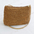 Golden grass shoulder bag, 'Woven Sunlight' - Handcrafted Braided Golden Grass Shoulder Bag from Brazil thumbail