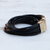 Leather cord bracelet, 'Golden Lunar Rotations' - Brazilian Black Leather Cord Bracelet w/ Golden Clasp
