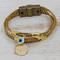 Gold-accented golden grass charm bracelet, 'Protective Eye' - Lord's Prayer Medallion Golden Grass Bracelet