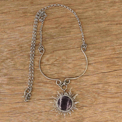 Amethyst pendant necklace, 'Purple Rays' - Stainless Steel Sun Pendant Necklace with Amethyst Gemstone