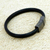 Leather wristband bracelet, 'Black Cosmopolitan' - Unisex Black Leather Wristband Bracelet with Zamac Clasp (image 2b) thumbail
