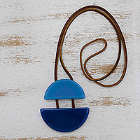 Recycled fused glass and leather pendant necklace, 'Crescent in Blue' - Blue Recycled Fused Glass Pendant Necklace with Leather Cord