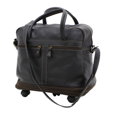 Erweiterbare Reisetasche aus Leder mit Rollen - Erweiterbare Reisetasche aus Leder in Schwarz und Marineblau mit Rollen