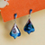 Silver and resin dangle earrings, 'Dulcet Nature' - Pinecone-Shaped Cool-Toned Silver and Resin Dangle Earrings
