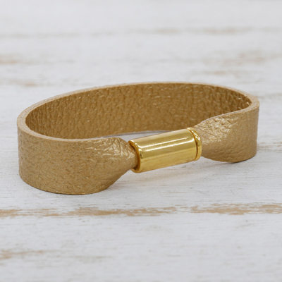 Faux leather wristband bracelet, 'Winner's Ribbon' - Golden-Toned Faux Leather Wristband Bracelet from Brazil
