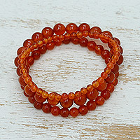 Carnelian beaded stretch bracelets, 'My Courageous Sides' (set of 3) - Set of Three Handcrafted Carnelian Beaded Stretch Bracelets
