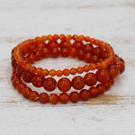 Carnelian beaded stretch bracelets, 'My Courageous Sides' (set of 3) - Set of Three Handcrafted Carnelian Beaded Stretch Bracelets