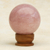 Rose quartz sculpture, 'Love Crystal Ball (3.3 Inch) - Petite Rose Quartz Crystal Ball Sculpture with Wood Stand (image 2) thumbail
