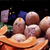 '50 Cents Each' - Fotografía en color de bodegón con papayas