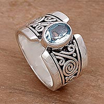 Artisan Crafted Sterling Silver Wide Ring with Blue Topaz, 'Blue Karma'