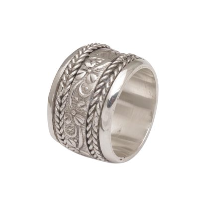 Sterling silver spinner ring, 'Floral Focus' - Wide Sterling Silver Spinner Ring with Floral Motifs