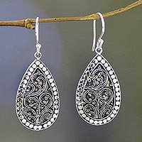 Sterling silver flower earrings, 'Denpasar Mystique' - Balinese Style Sterling Silver Dangle Earrings