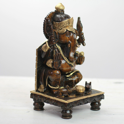 Wood sculpture, 'Ganesha Gaze' - Hand Carved Kadam Wood Ganesha Sculpture with Gold Tone